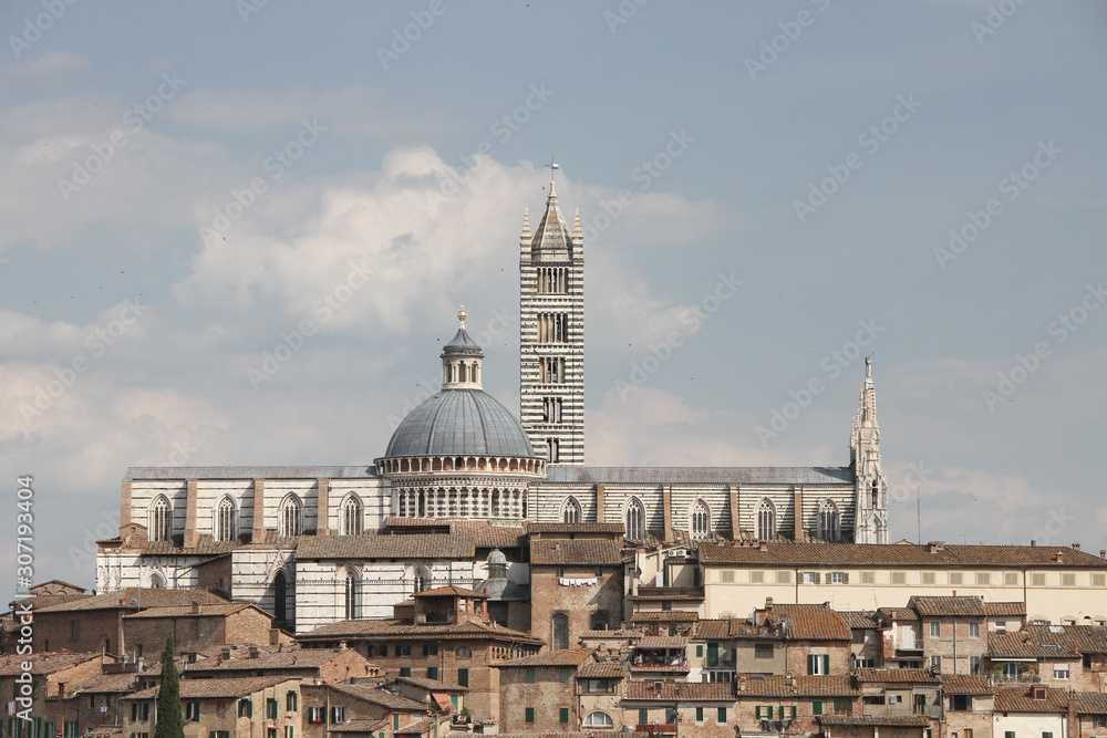 Lateral view of the Siena cathedral, a medieval church in Siena, Tuscany, Italy