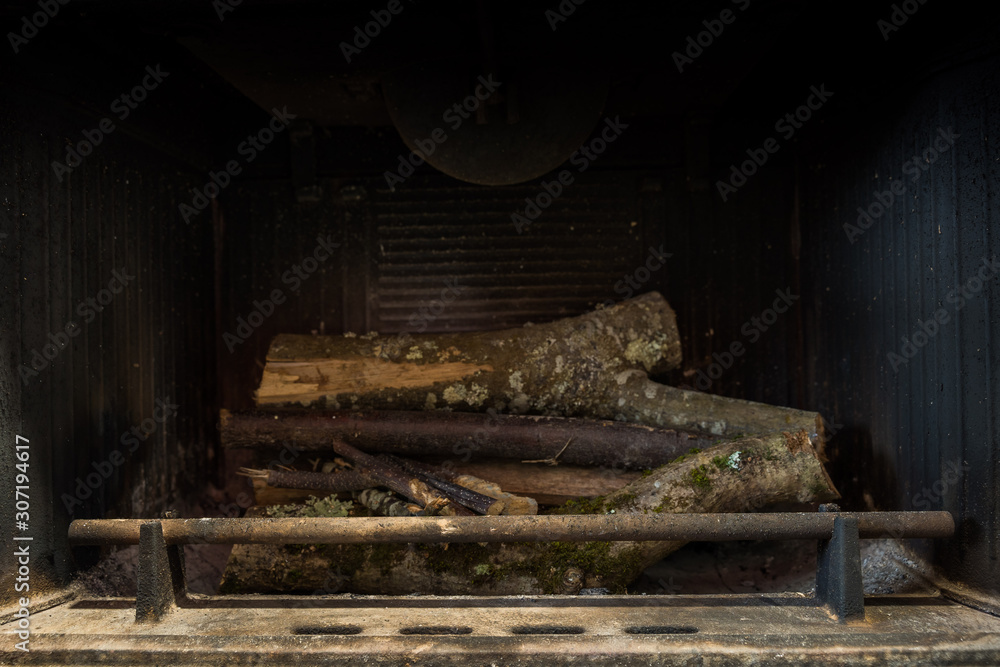 Living room fireplace with wooden sticks Living room fireplace with wooden sticks