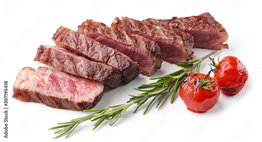 Sliced Grilled Beef Steak with tomatoes and rosemary Isolated on white background