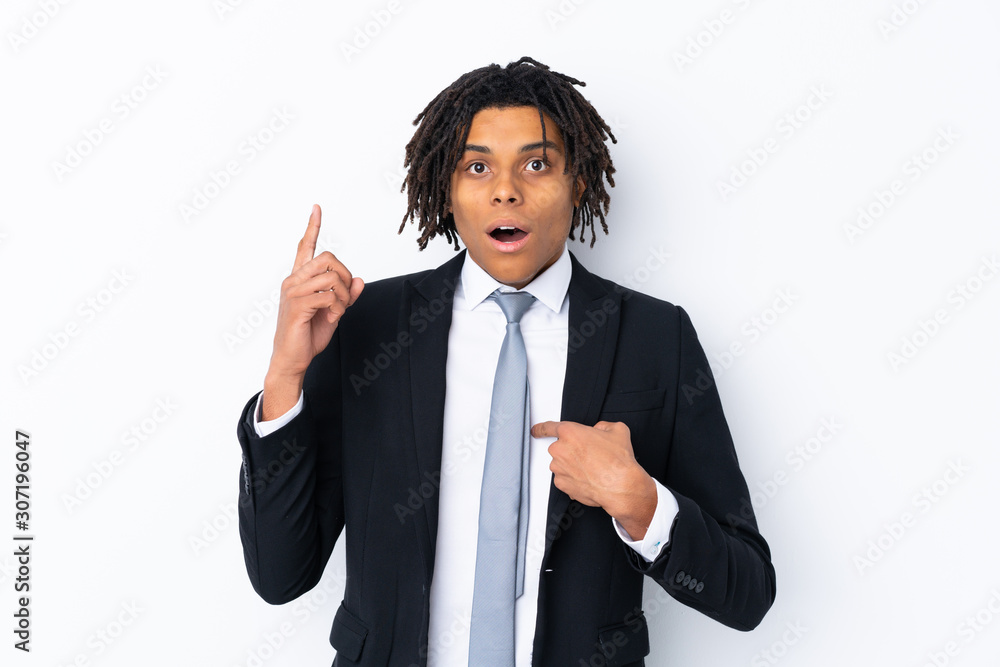 Young African American businessman man over isolated white background with surprise facial expression Young African American businessman man over isolated white background with surprise facial expression
