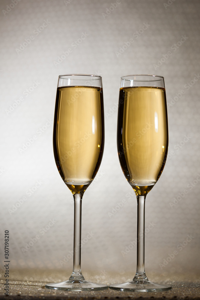 Drink. Two glasses white wine, light background