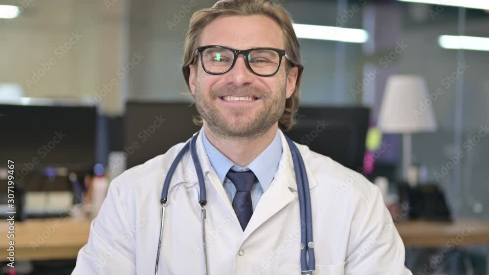 Portrait of Cheerful Doctor Smiling at Camera Portrait of Cheerful Doctor Smiling at Camera