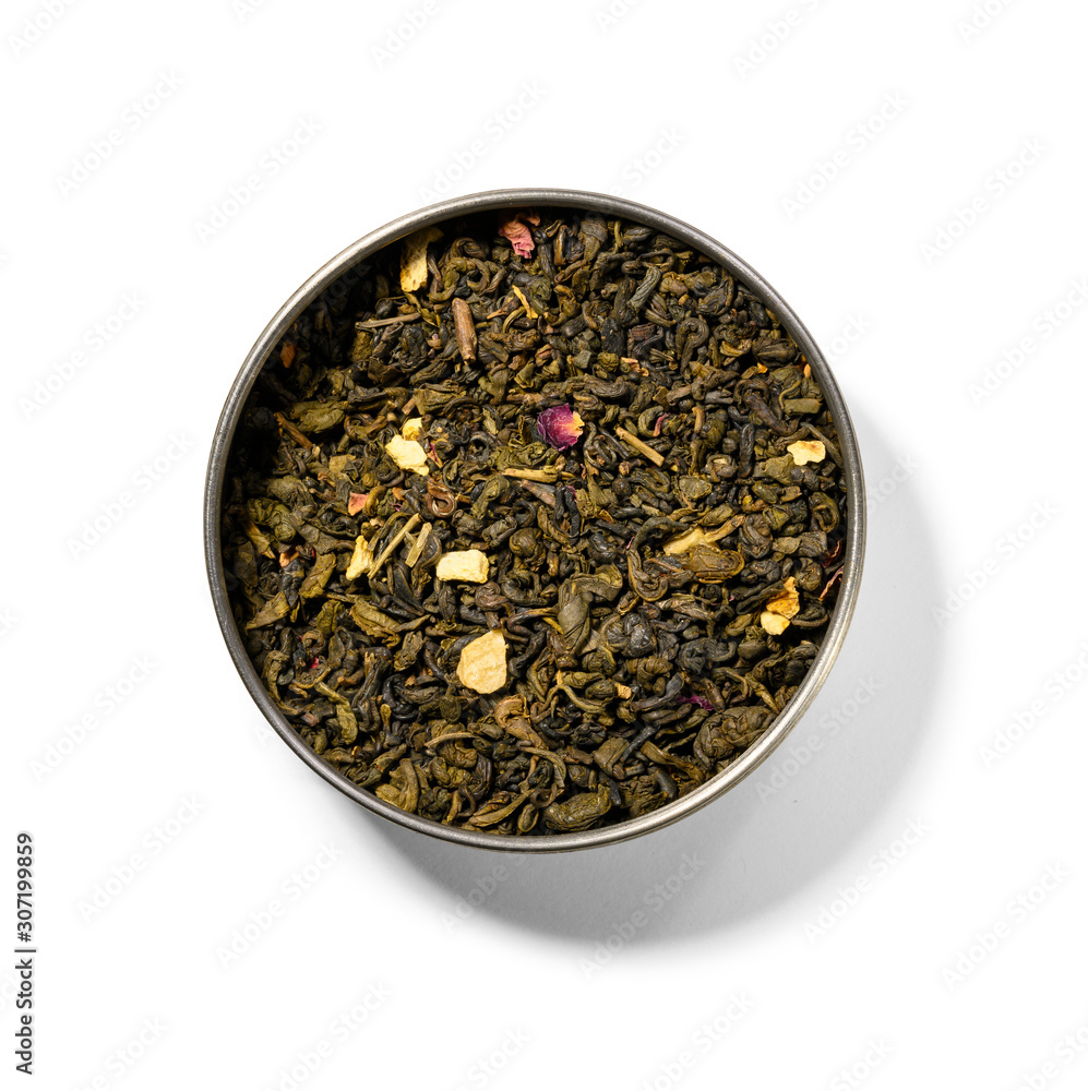 Fototapeta premium Green tea with aromatic additives. Top view on white background