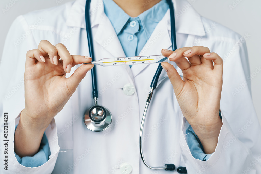 doctor holding stethoscope doctor holding stethoscope