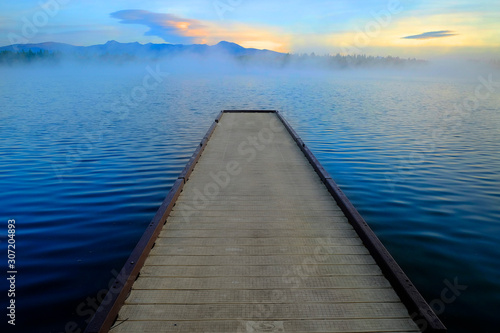 Fototapeta Naklejka Na Ścianę i Meble -  Dock on Lake Early Morning Mist