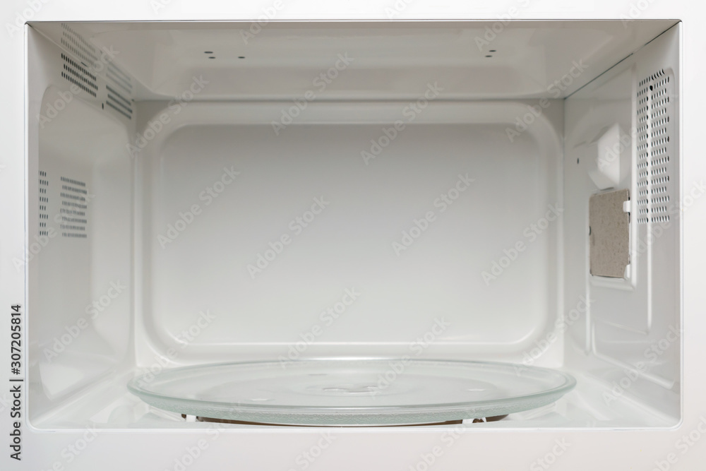 Microwave oven cooking chamber. Inside view. Microwave oven cooking chamber. Inside view.