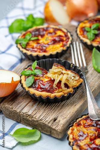 Homemade mini pies with onions.