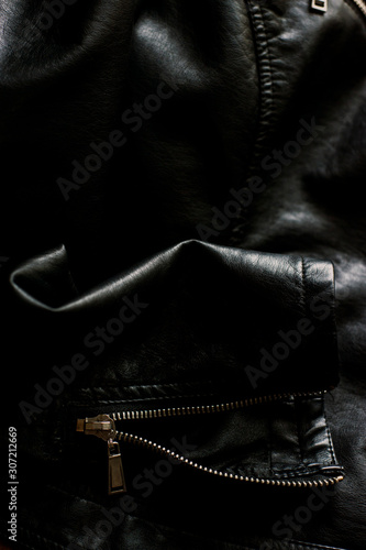 Close up of black leather jacket