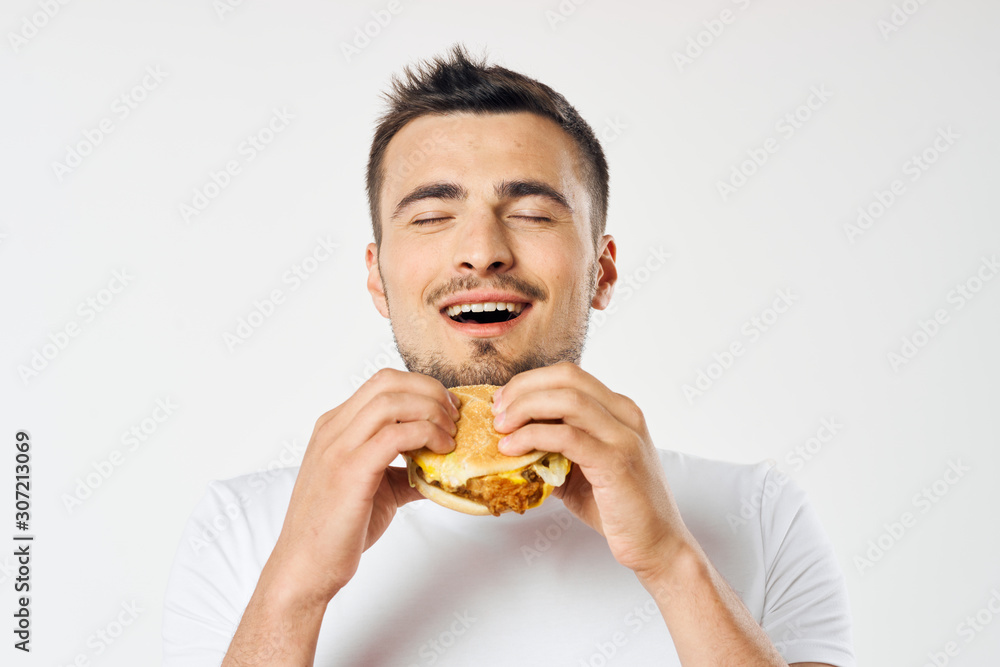 man with hamburger isolated on white