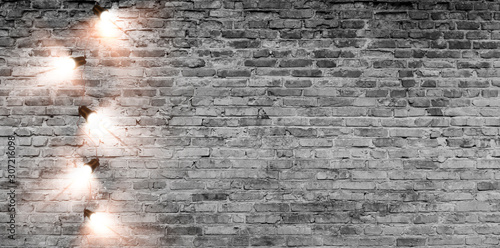 Brick wall with a garland o...