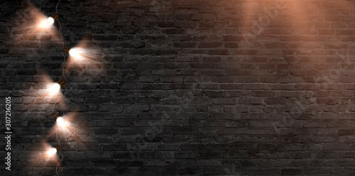 Brick wall with a garland o...