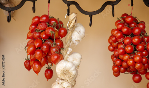 garlic and tomato hanging together