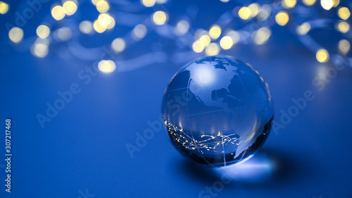 Globe with america usa on blue background with golden lights