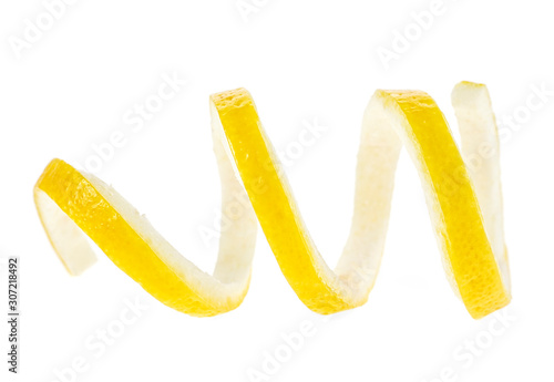 Citrus twist peel on a white background. Spiral of lemon skin.