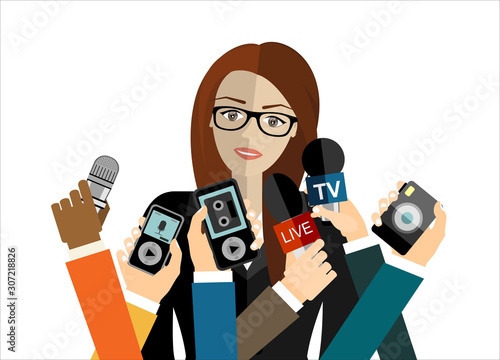 Business woman giving an interview in the presence of journalists with microphones.