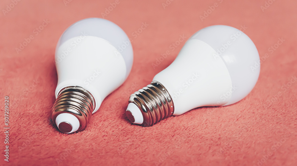 Light bulbs on a soft fluffy peach-colored background Light bulbs on a soft fluffy peach-colored background