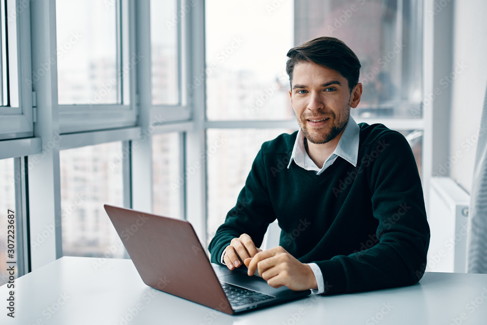 businessman working on laptop in office businessman working on laptop in office