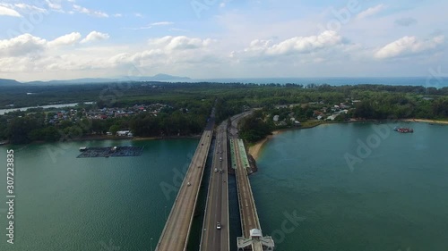 Wallpaper Mural aerial view Sarasin bridge connect Phang Nga province to Phuket island.  The old bridge was renovated to be a tourist attraction and a viewpoint in the middle of the sea. Torontodigital.ca