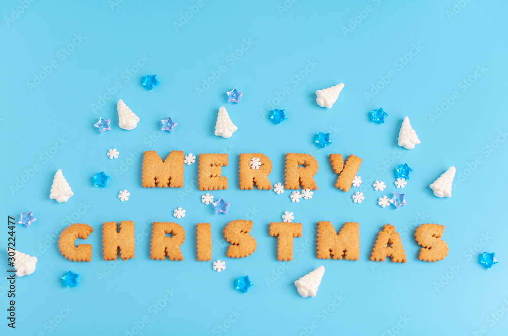 cookies letters Merry Christmas on blue background. creative Christmas concept. cookies letters Merry Christmas on blue background. creative Christmas concept.