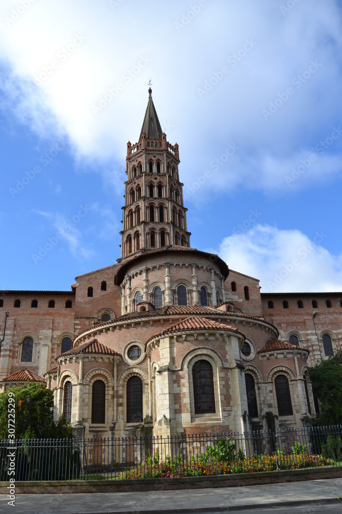 Basilica of Saint-Sernin in Toulouse: view of the altar and bell tower from the side of Saint-Bernard street