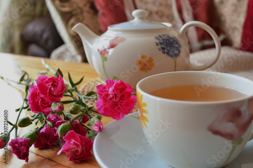 tea and flowers on the table 