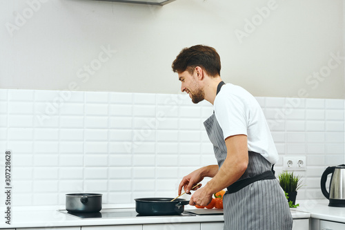man working in kitchen