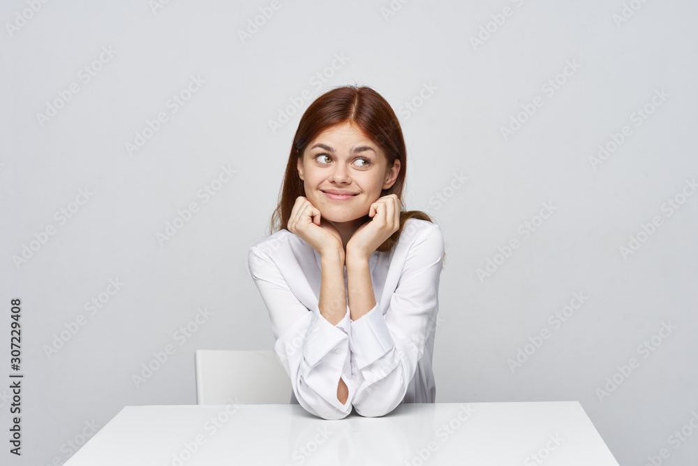 business woman sitting at desk with laptop business woman sitting at desk with laptop