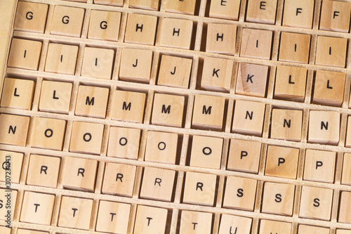 Alphabet letters written on wooden cubes for children education