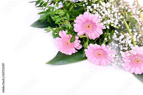 Bouquet of pink gerberas on a white background. Background for postcards and text. Copy space
