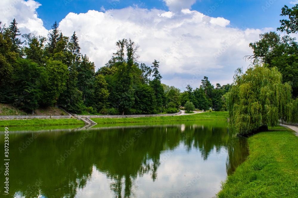 The lake in Feofania park, sunny summer landscape in Kyiv, Ukraine on July 15, 2018. 