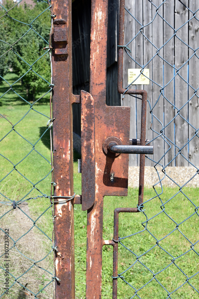 Old Rusty Handle & Lock on Steel Wire Gate 6519-042 Old Rusty Handle & Lock on Steel Wire Gate 6519-042