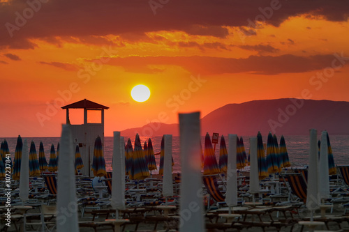 Dramatic sunset sunrise over the italian tirrenean coastline,Tuscany, Marina di Grosseto, Castiglione Della Pescaia, Italy