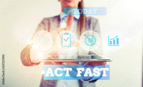 Text sign showing Act Fast. Business photo text Voluntarily move in the highest state of speed initiatively Female human wear formal work suit presenting presentation use smart device