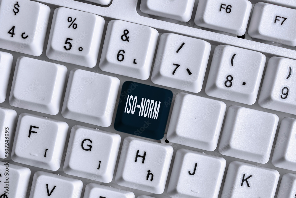 Handwriting text Iso Norm. Conceptual photo An accepted standard or a way of doing things most showing agreed White pc keyboard with empty note paper above white background key copy space
