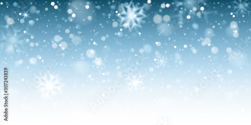 Christmas snow background. Blue frozen background. Snowflakes. Vector illustration.