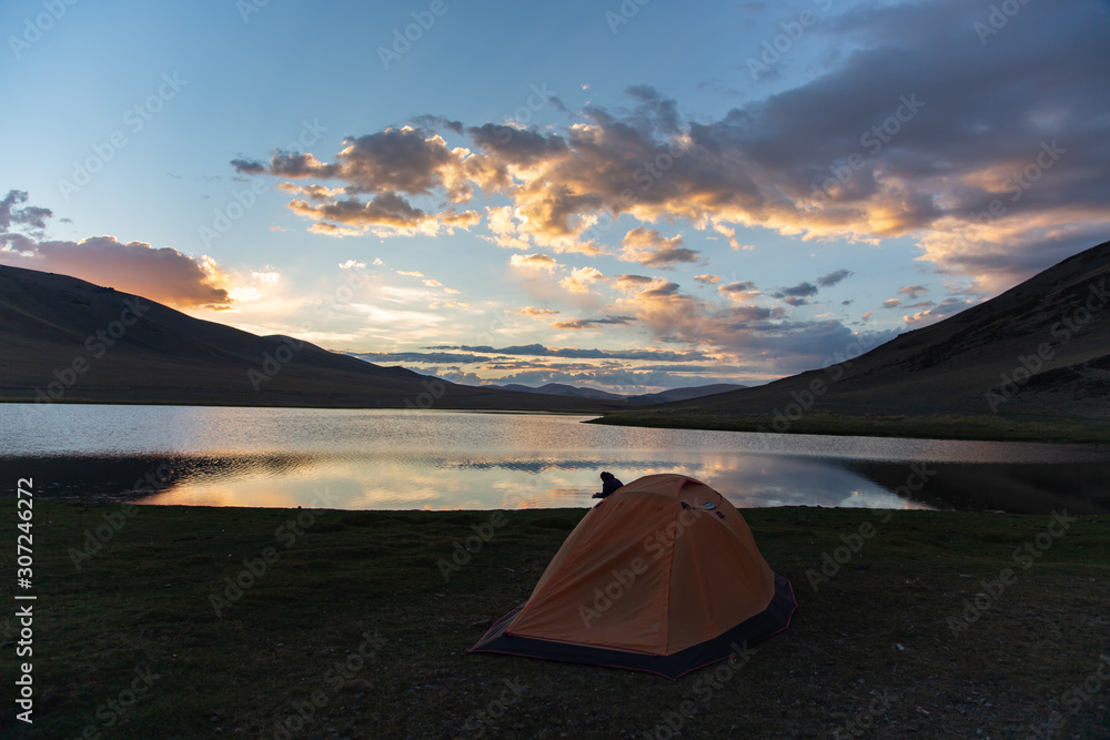 sunset on a lake in Mongolia tent