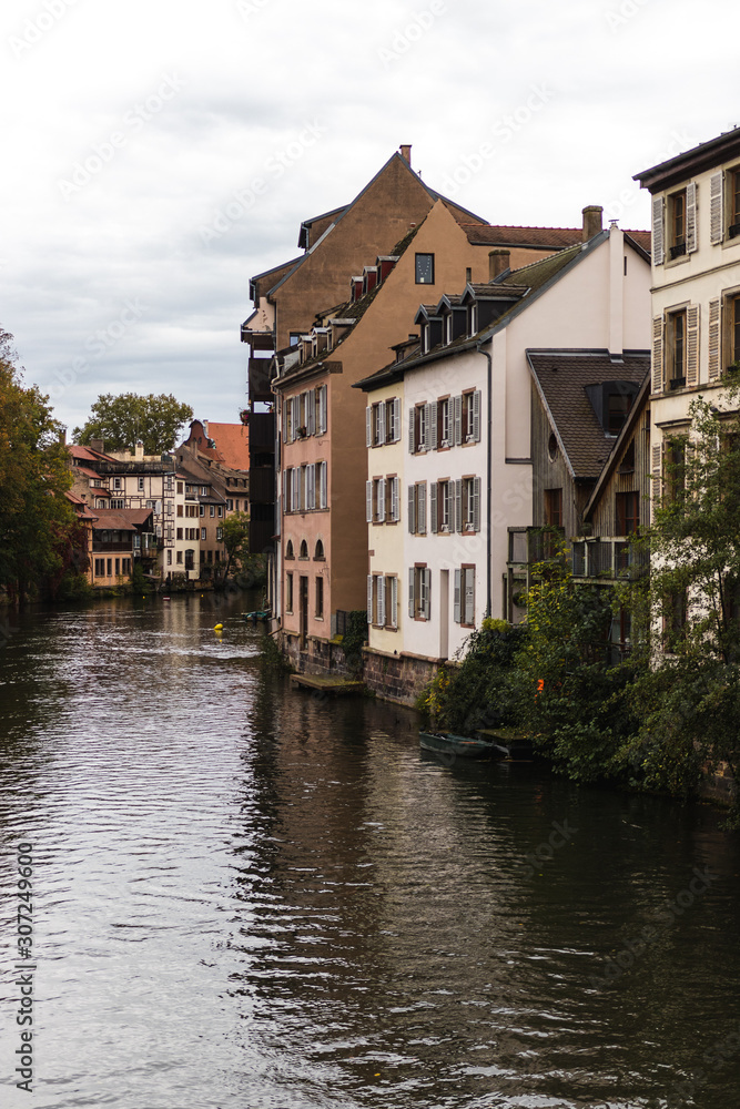 River side in Strassbourg, France - typical old houses and bridges in this old historical city River side in Strassbourg, France - typical old houses and bridges in this old historical city