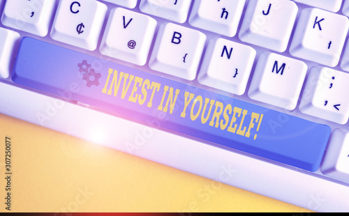 Text sign showing Invest In Yourself. Business photo text nvesting in a coach or a training to learn new things White pc keyboard with empty note paper above white background key copy space photo