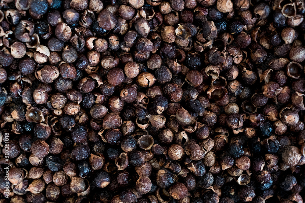 High angle close up of dried brown soap nuts. High angle close up of dried brown soap nuts.