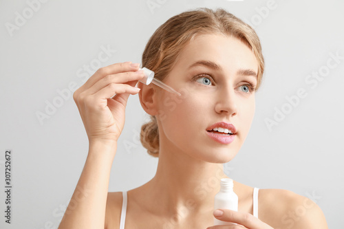 Beautiful young woman with ...