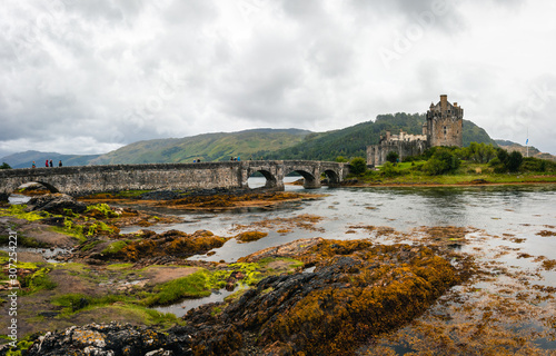 Magnificent Eilean Donan castle during cloudy weather at low tide © Ondej