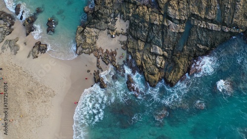 Ocean View Sandy Beach with rock cliffs. Aerial drone view of Puerto Vallarta, Jalisco Mexico. photo