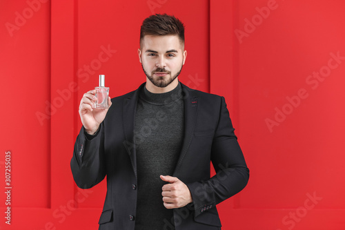 Handsome young man with bot...