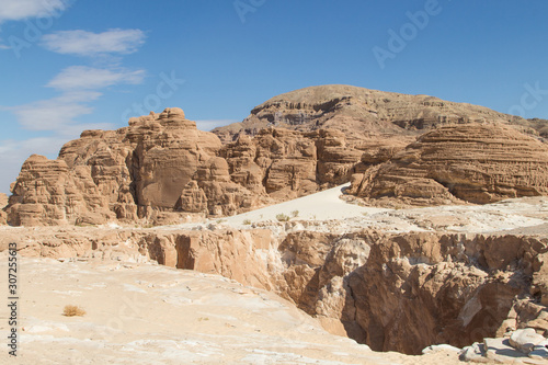 Desert  red mountains  rocks and blue sky. Egypt  the Sinai Peninsula.
