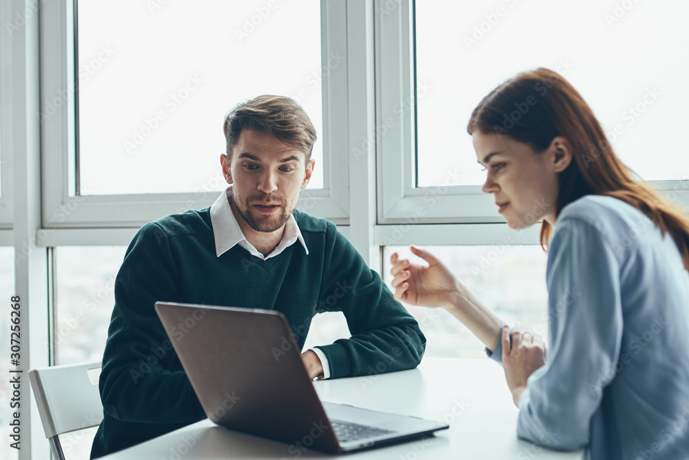 businessman and businesswoman working in office businessman and businesswoman working in office