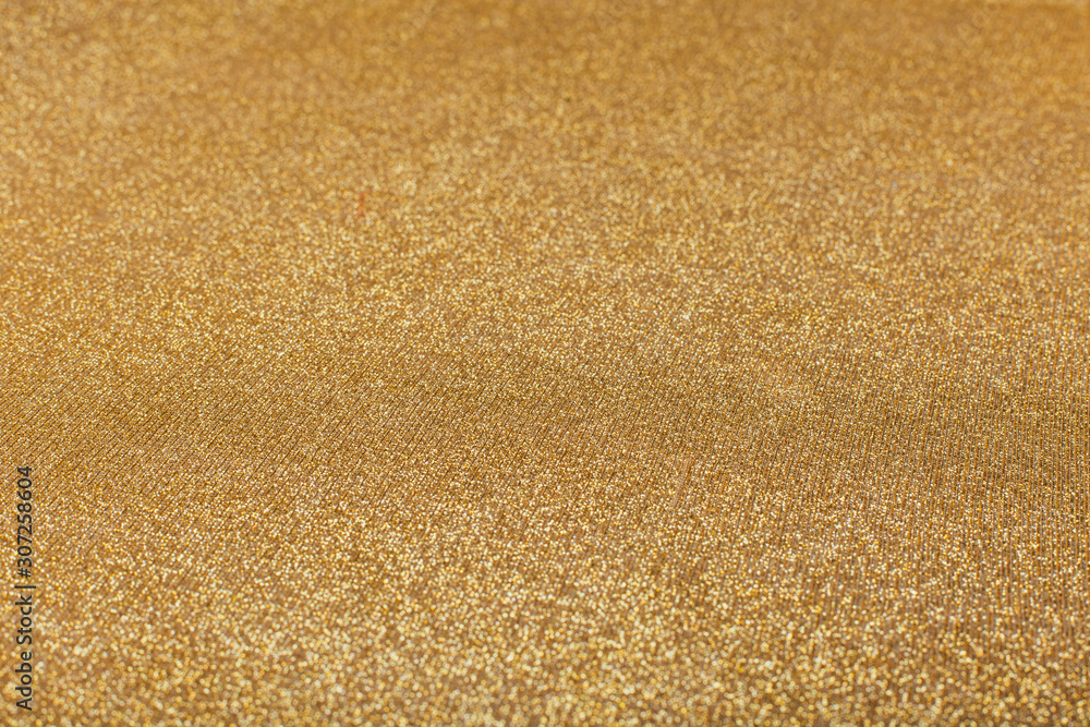 Abstract blurred gold sparkle bakground. Abstract blurred gold sparkle bakground.