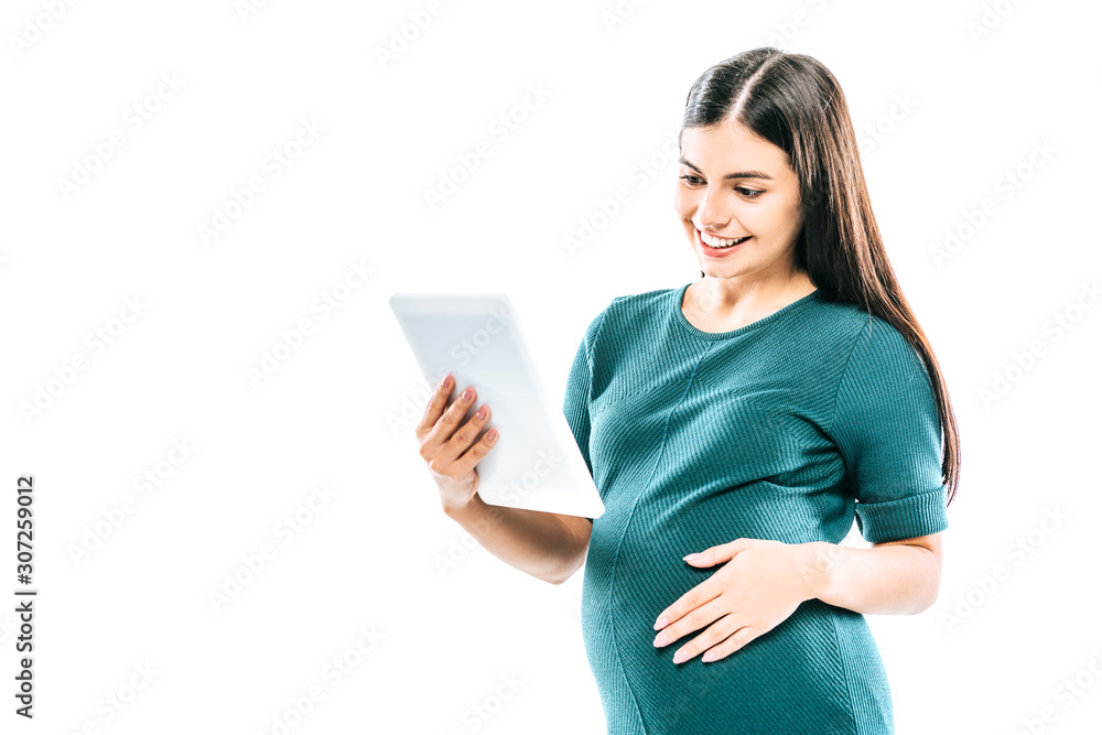 smiling pregnant girl using digital tablet isolated on white smiling pregnant girl using digital tablet isolated on white