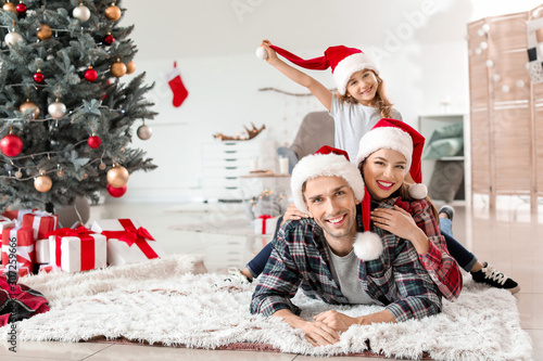 Happy family at home on Chr...