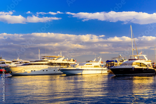 White luxury yachts in a sea harbor of Hurghada, Egypt. Marina with tourist boats on Red Sea © ihorbondarenko
