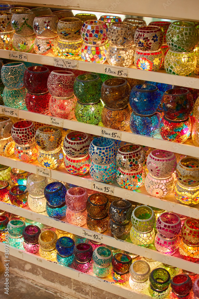 Traditional Turkish colorful ceramics, dishes, bowls, plates, cups, on the souvenir shop of Grand Bazaar.